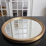 Oval mirror in gilded wood 43x53cm