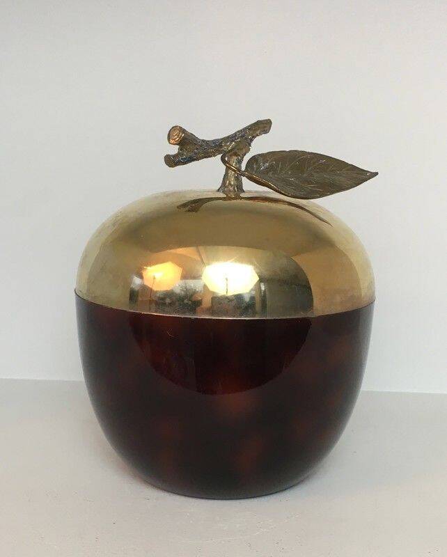 Apple-shaped ice bucket in red celluloid, gold-tone metal and plastic