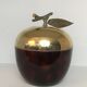 Apple-shaped ice bucket in red celluloid, gold-tone metal and plastic