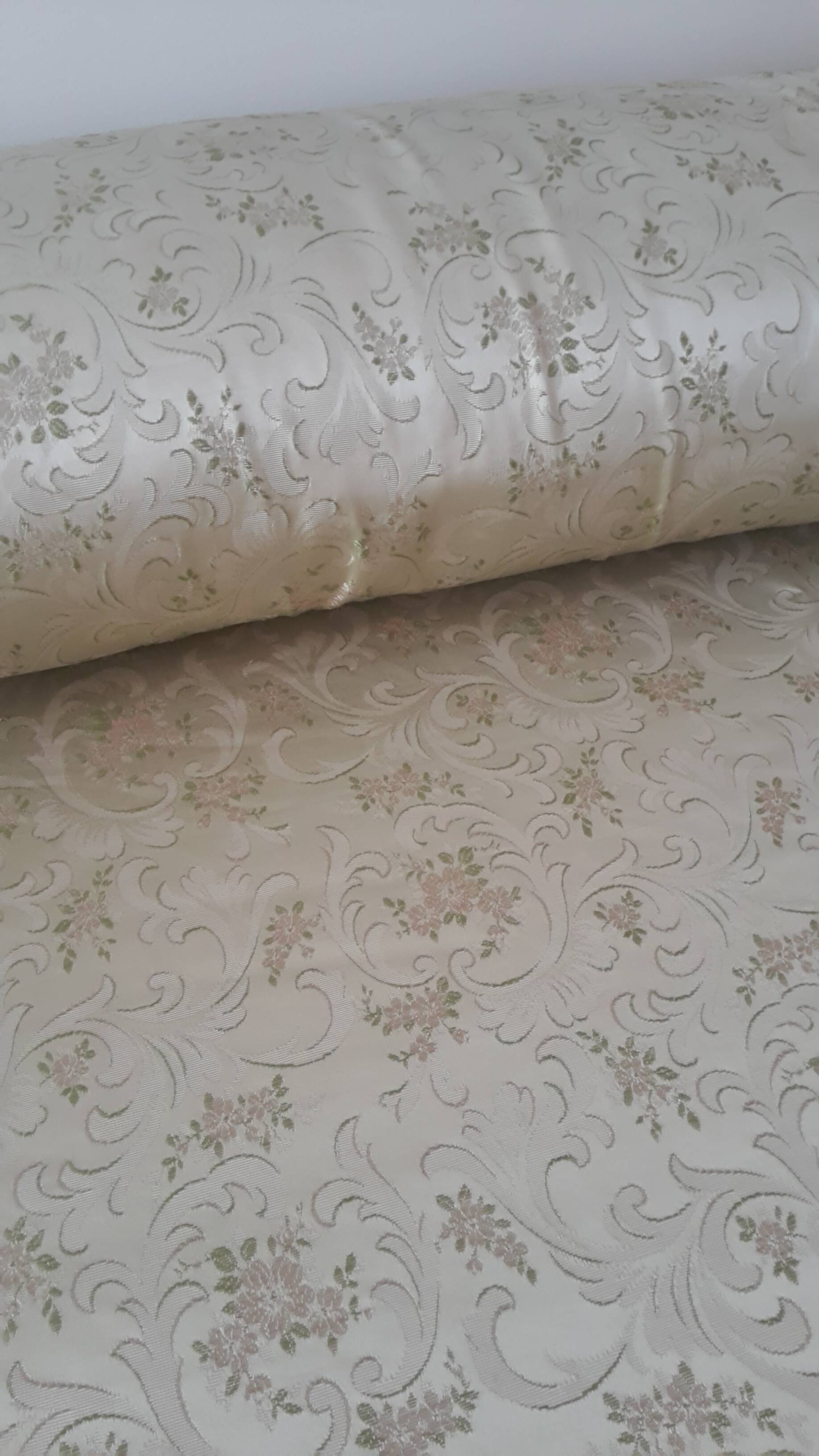 Cabinetmaker's bed frame and matching upholstered bedspread