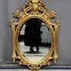 Baroque style gilded mirror. Wood.