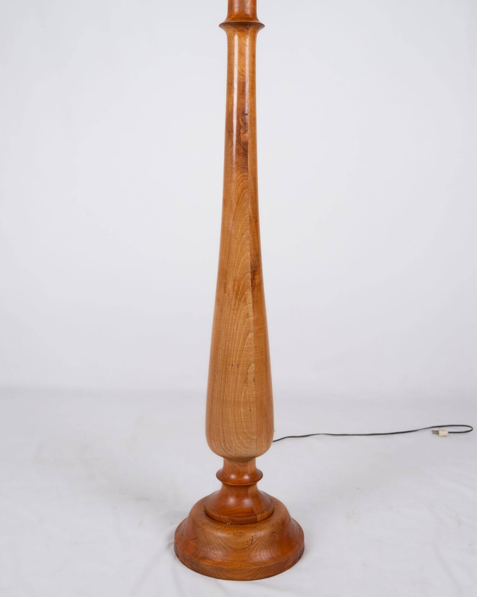 Pair of turned wooden floor lamps in Art Deco style, France, mid-20th century.