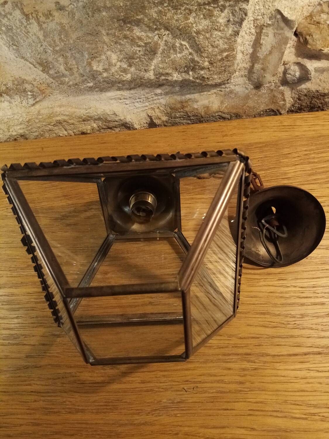 Glass and brass suspension