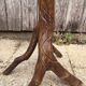 "Root" gueridon in solid wood — organic silhouette, brutalist spirit.