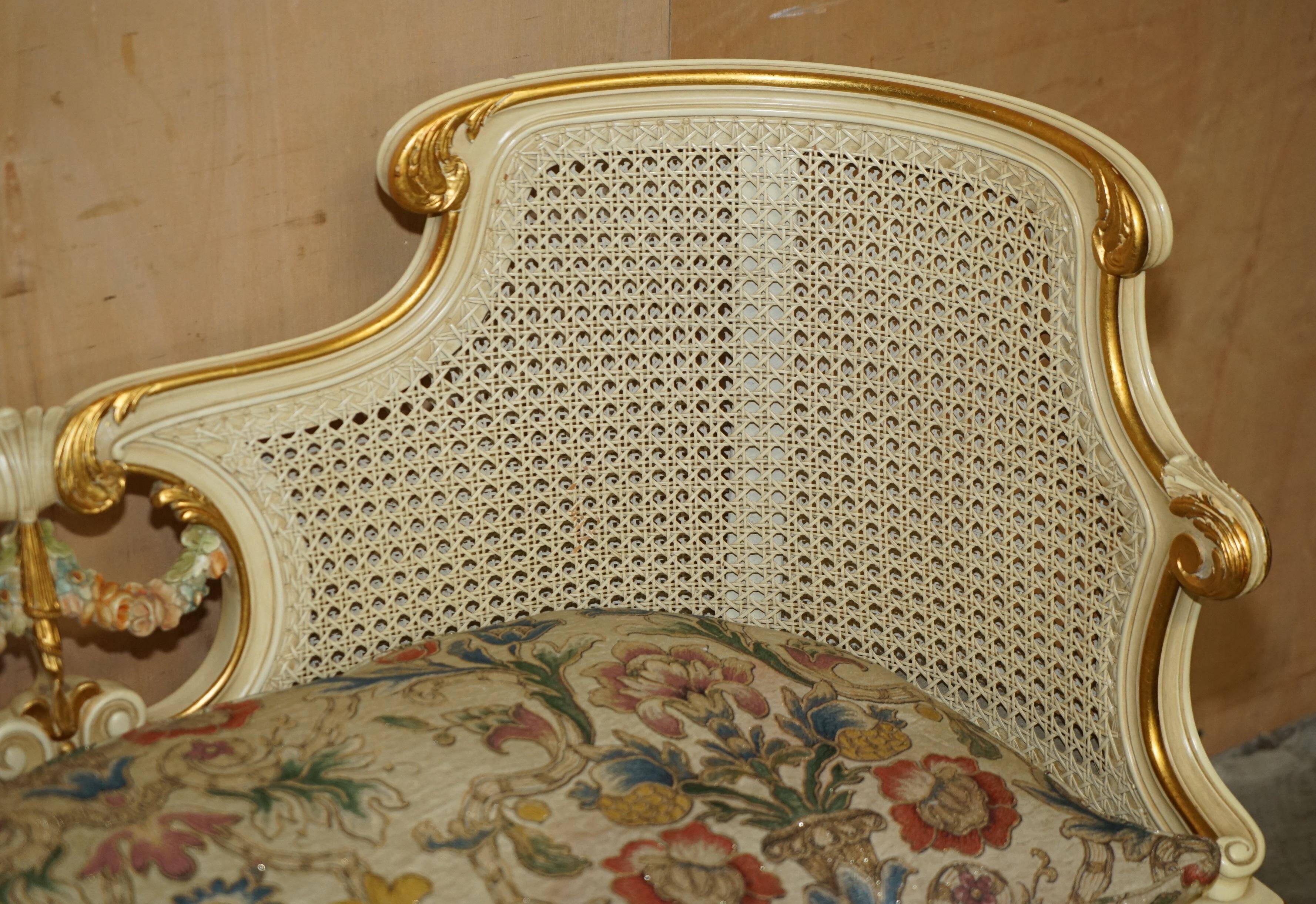 Louis XV window bench embroidered in gold and silver leaf.