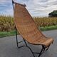 Large vintage metal and wicker armchair