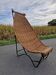 Vintage armchair in metal and wicker, large model.