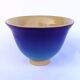 Blue glazed stoneware bowl on a foot, signed SP, Puisaye.