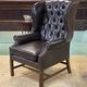 Chesterfield armchair with brown leather ears from the 1990s in very good condition