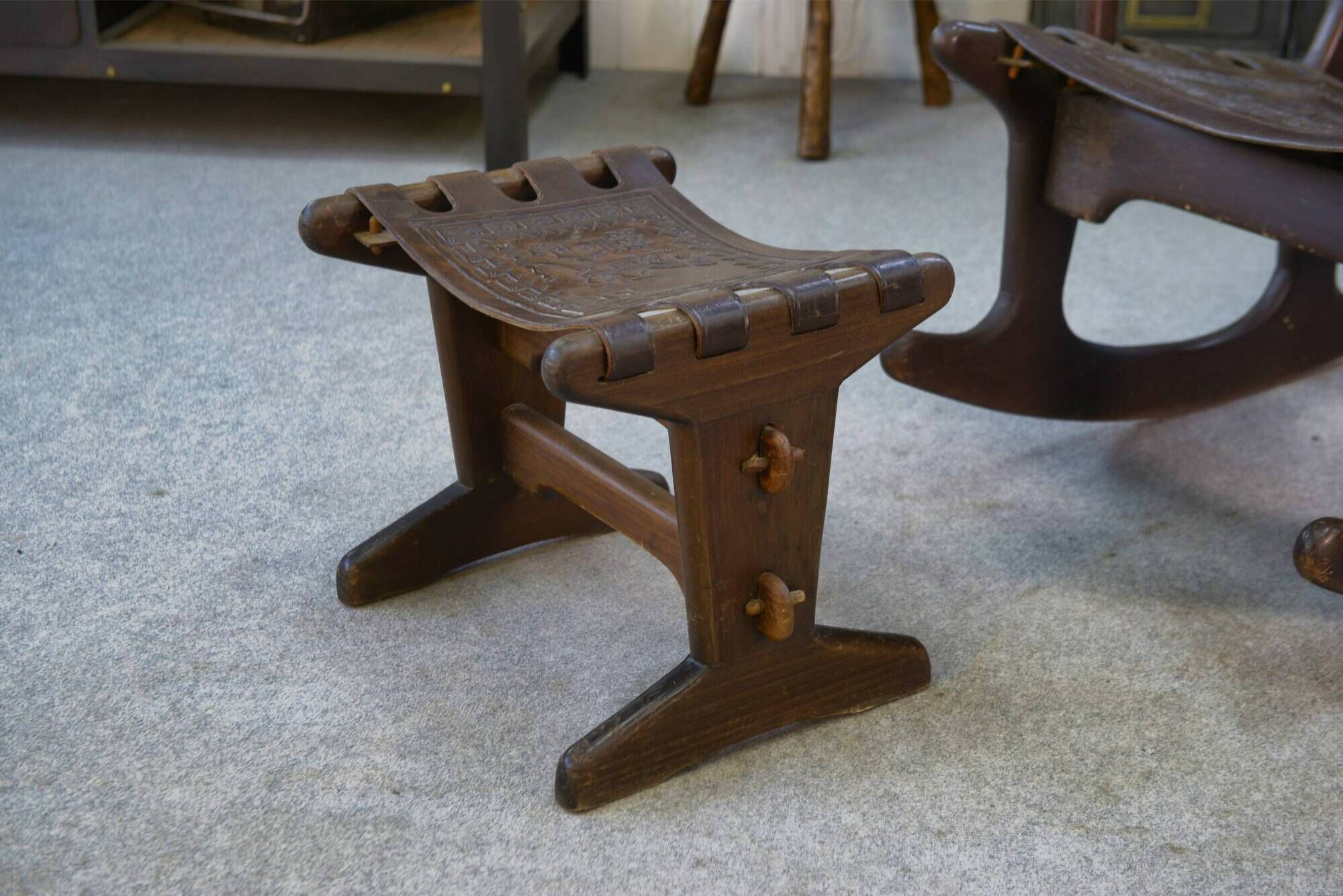 Armchair with ottoman by Angel Pazmino in brown wood and leather from the 1960s.