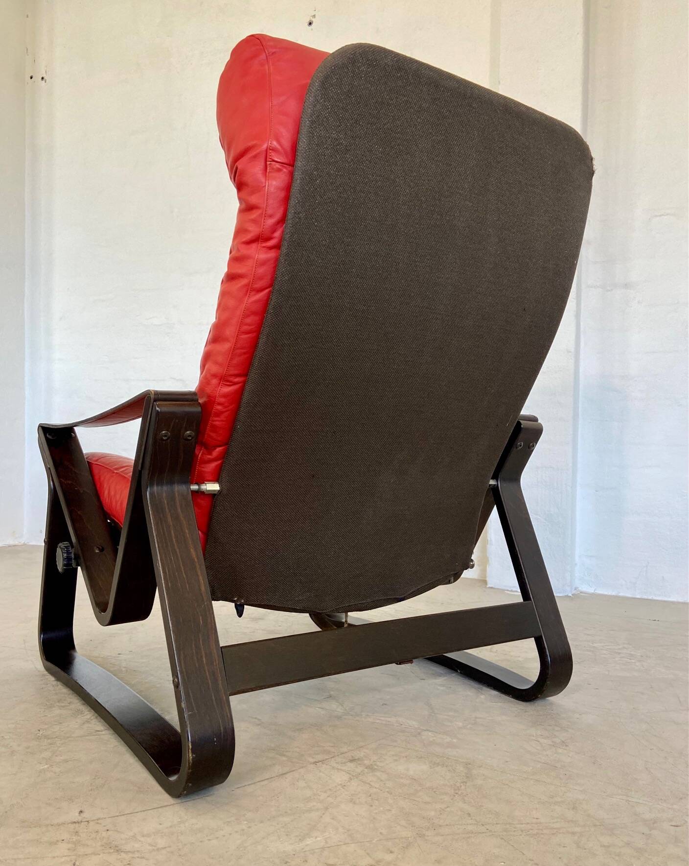 Vintage danish retro reclining lounge chair & stool in red leather by komfo