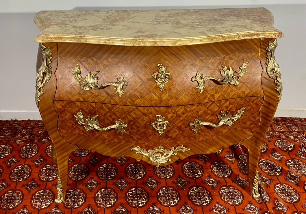 Louis XV chest of drawers, cubed rosewood marquetry, gilded bronzes, veined marble.