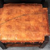 Brutalist oak lounge chair and ottoman, 1970s, set of 2