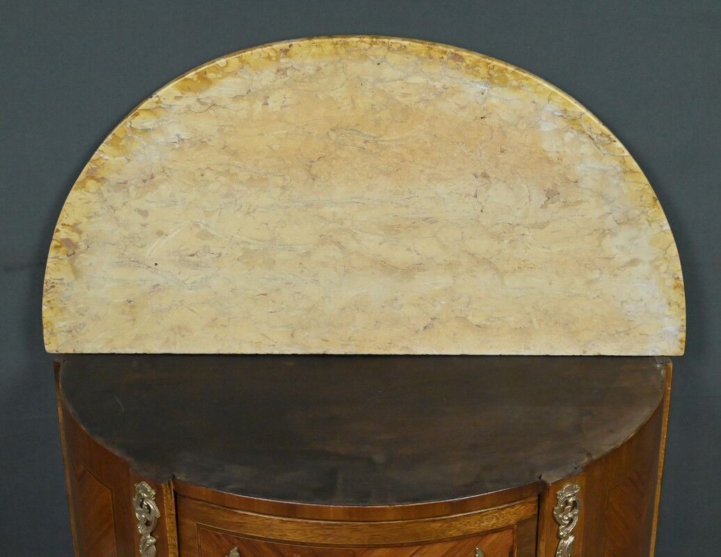 Small demi-lune jump commode in marquetry, transitional style between Louis XV and Louis XVI – early 20th century.