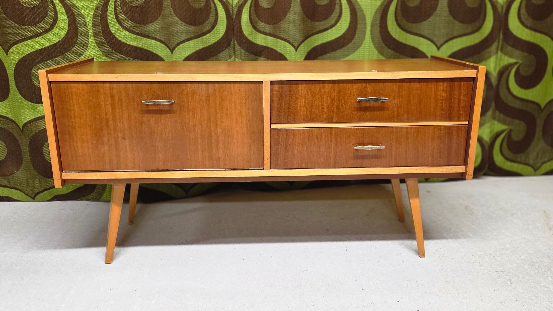 Small Scandinavian low sideboard 1960 vintage with tapered legs.