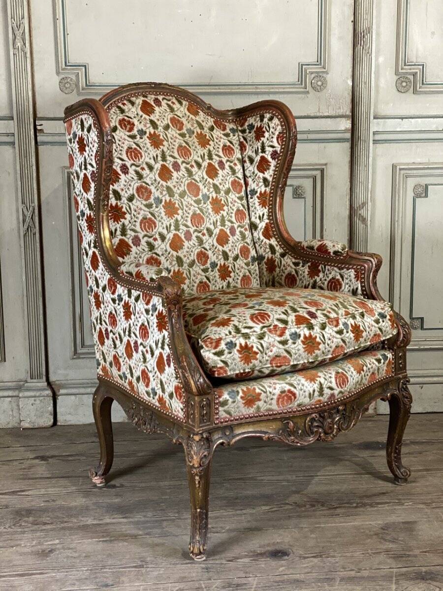 Regency style armchair in gilded wood