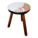 Antique tripod stool in wood and cowhide