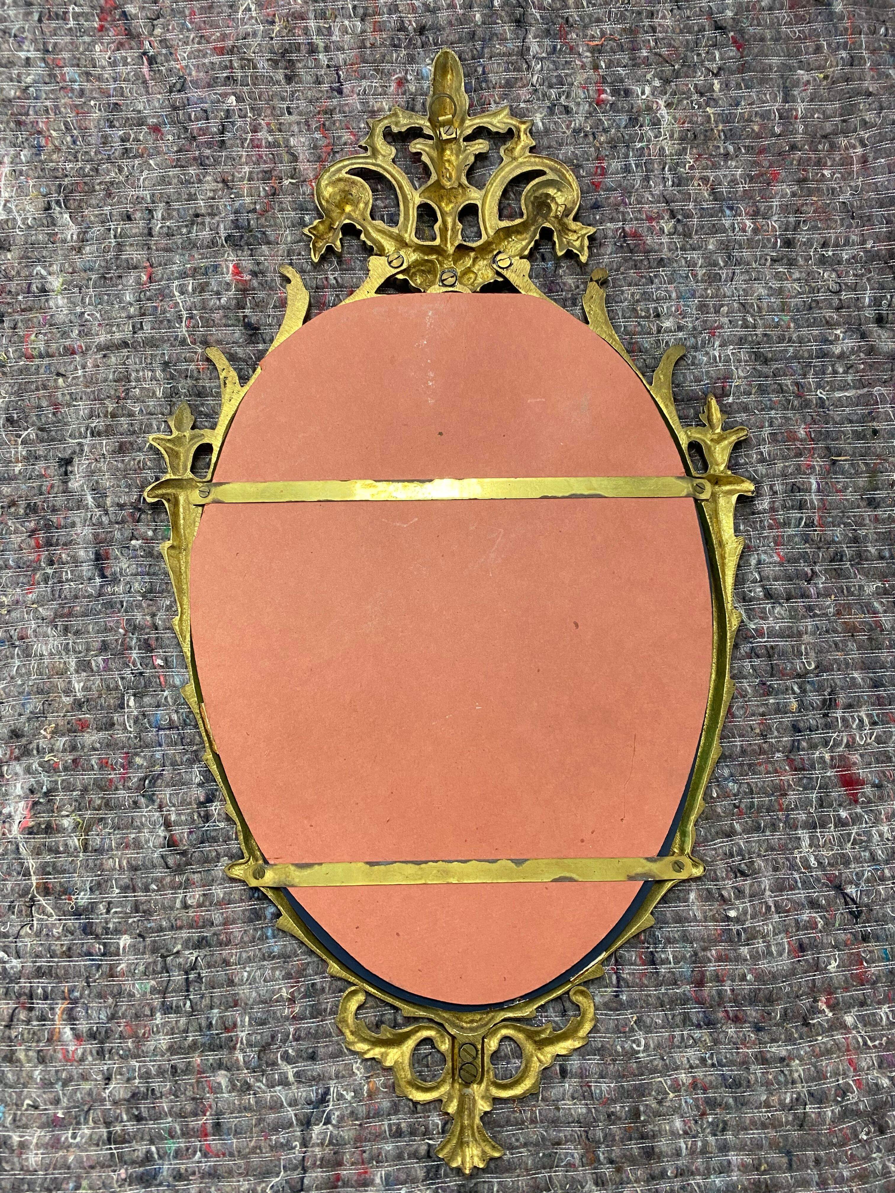 Oval gilded mirror