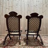 Paire de chaises longues de bateau en cannage