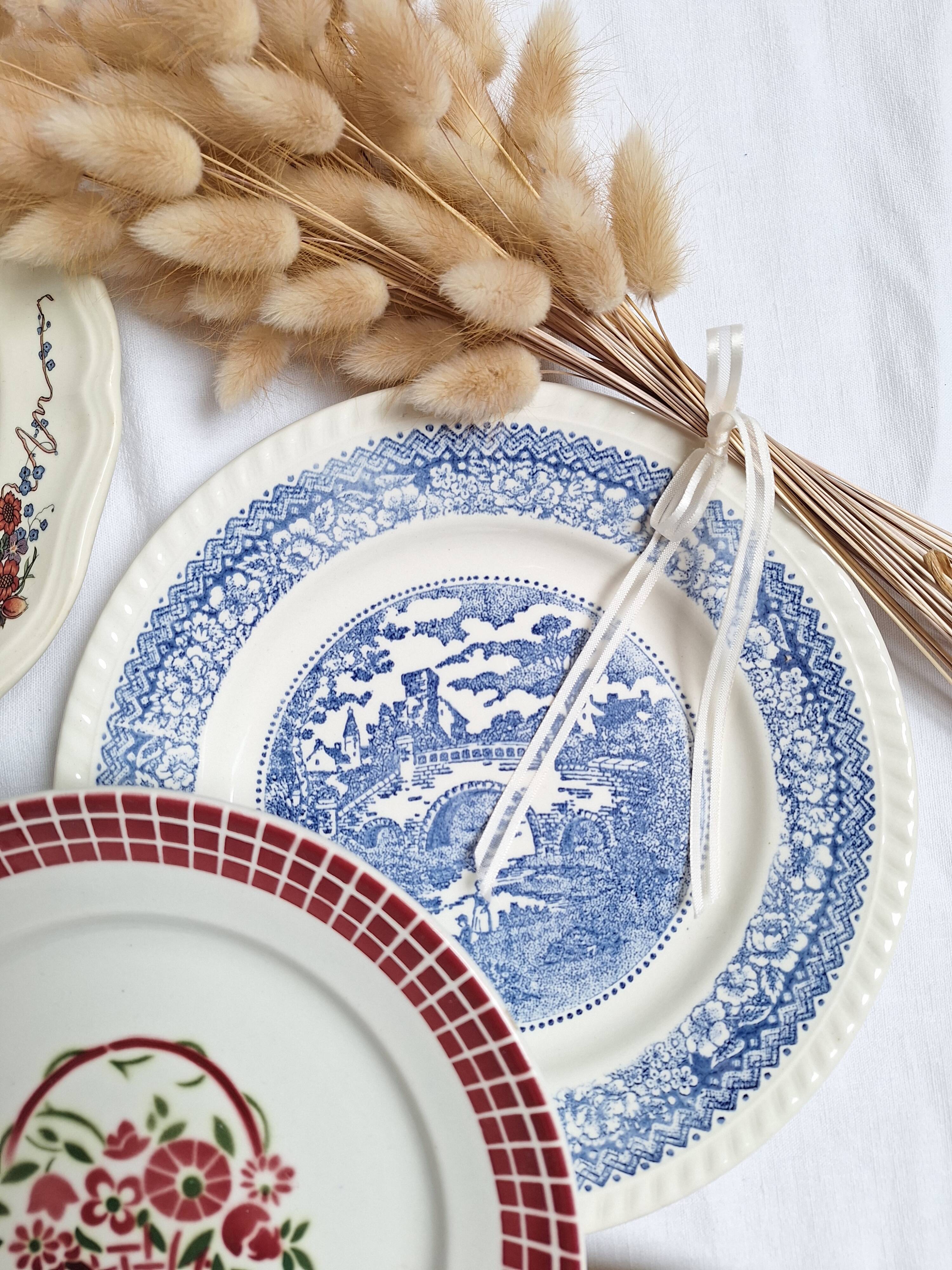 6 blue and pink dinner plates