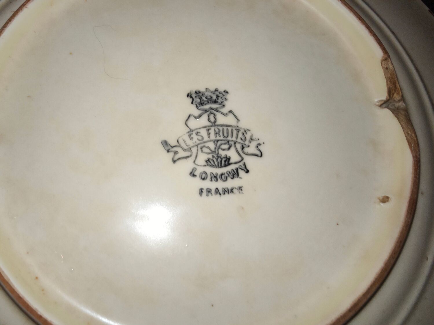 Faience plate in Longwy enamels signed Léa Valentin Les Fruits