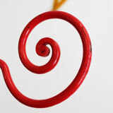 Baby cradle in red wrought iron