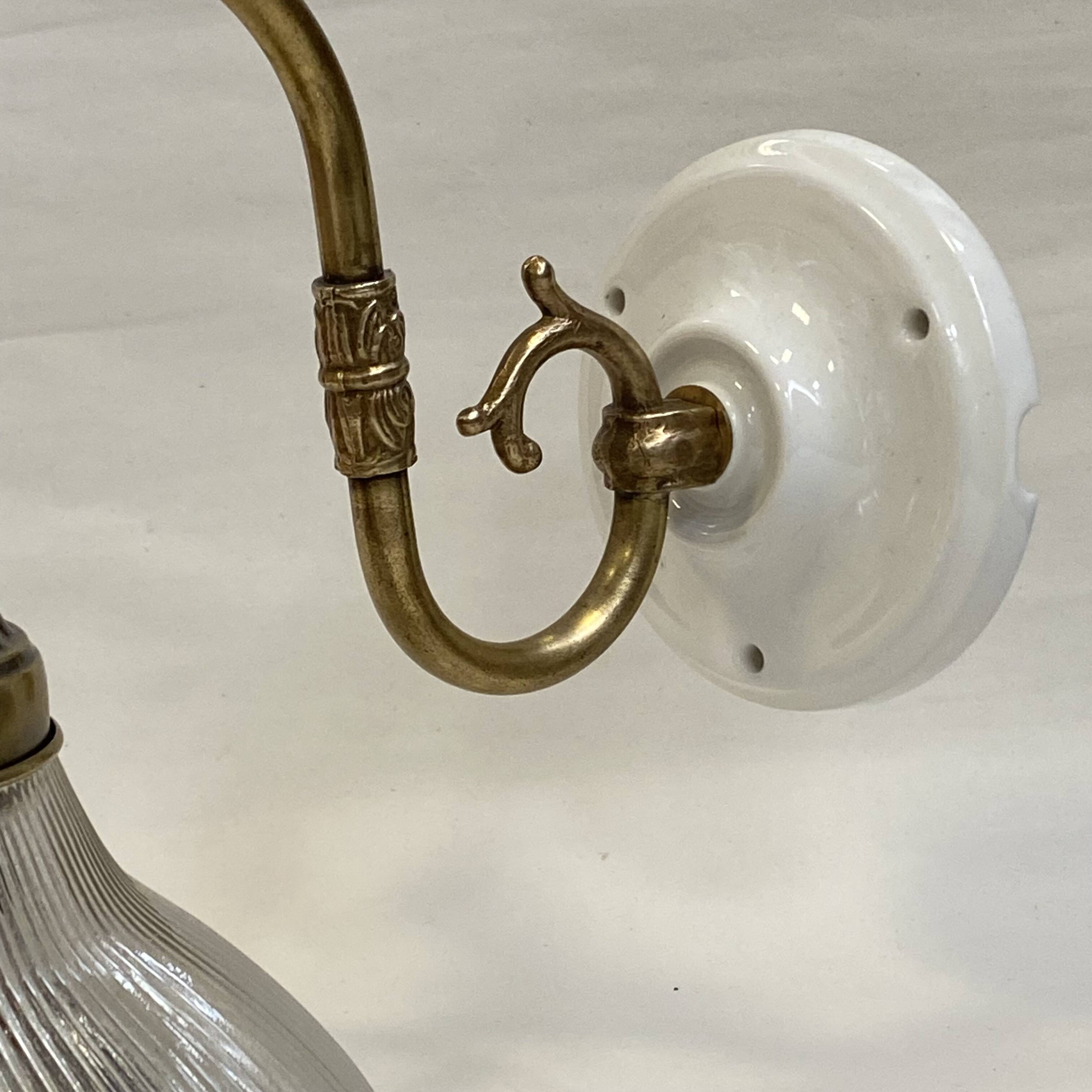 Swan neck wall light, brass, glass, holophane type, porcelain fixing