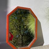 Octagonal beaded wooden mirror