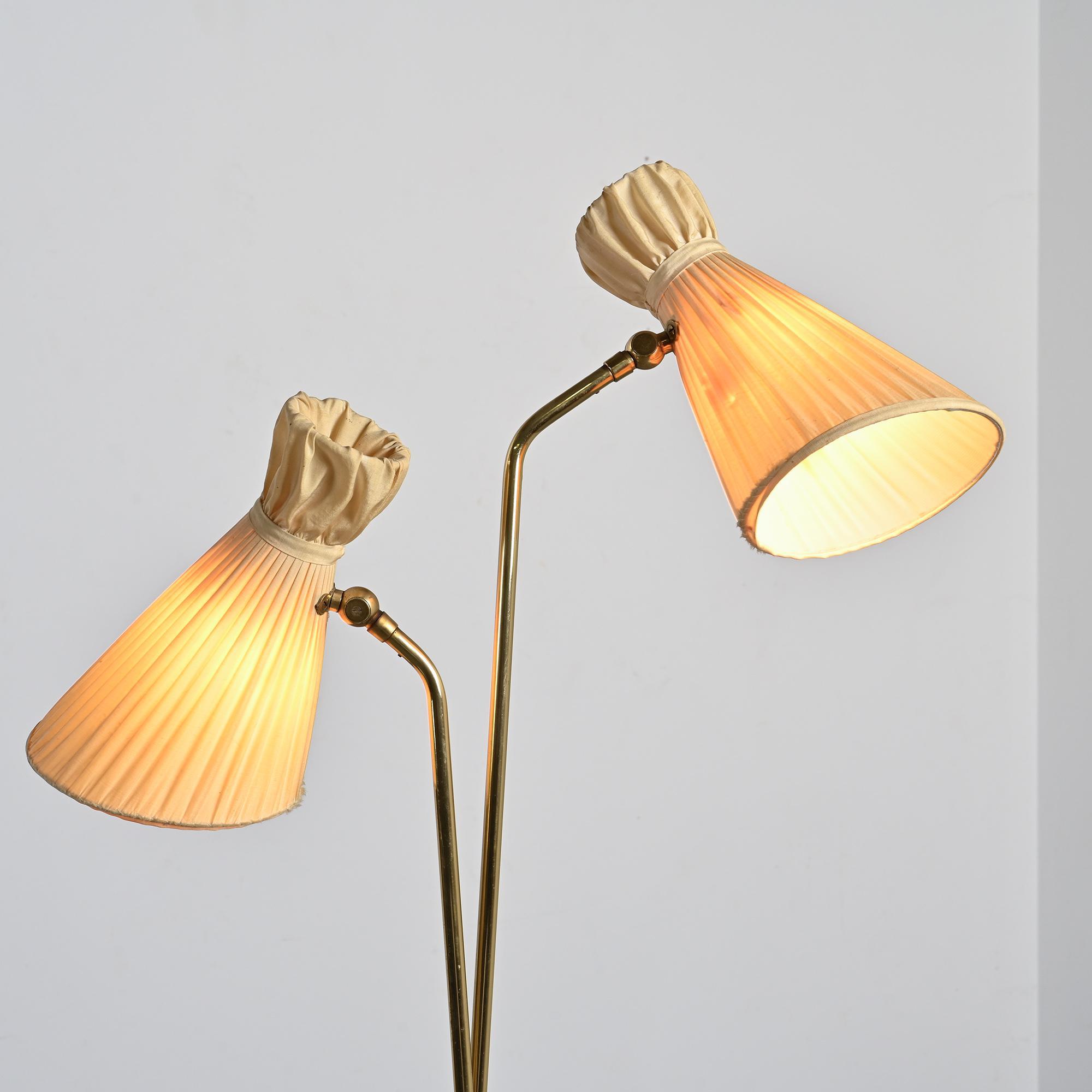 Two-arm adjustable floor lamp by BAG Turgi, Switzerland, 1950s.