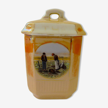 Small octagonal porcelain covered pot decorated with a reproduction of Millet's "The Angelus"