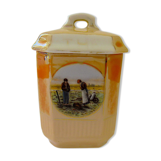 Small octagonal porcelain covered pot decorated with a reproduction of Millet's "The Angelus"