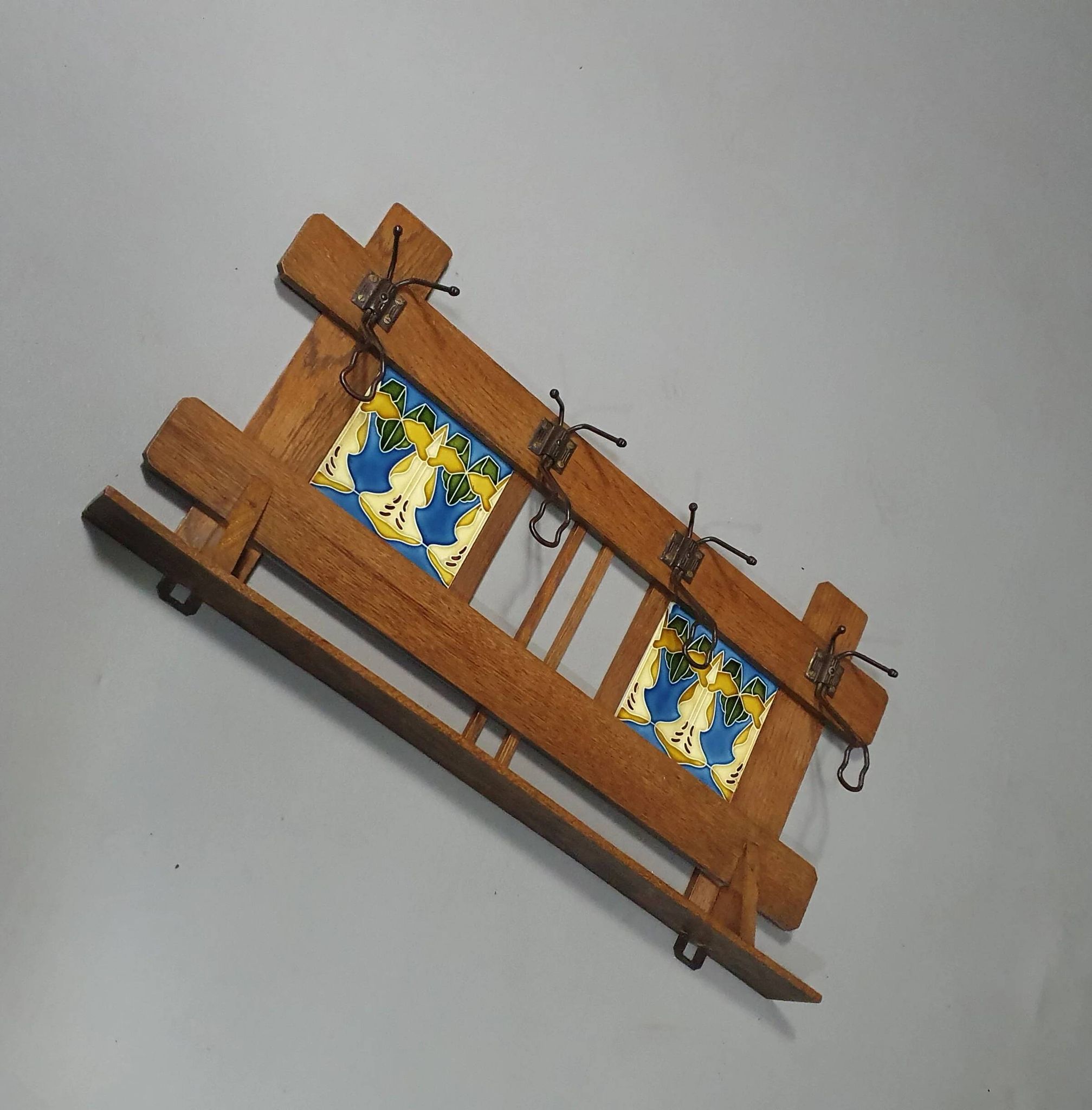Art Nouveau wall coat rack with tiles