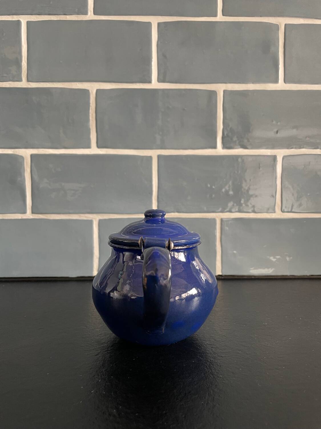 Mini blue enamelled sheet metal teapot