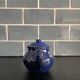 Mini blue enamelled sheet metal teapot