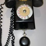 Old Ericsson wall telephone in black bakelite