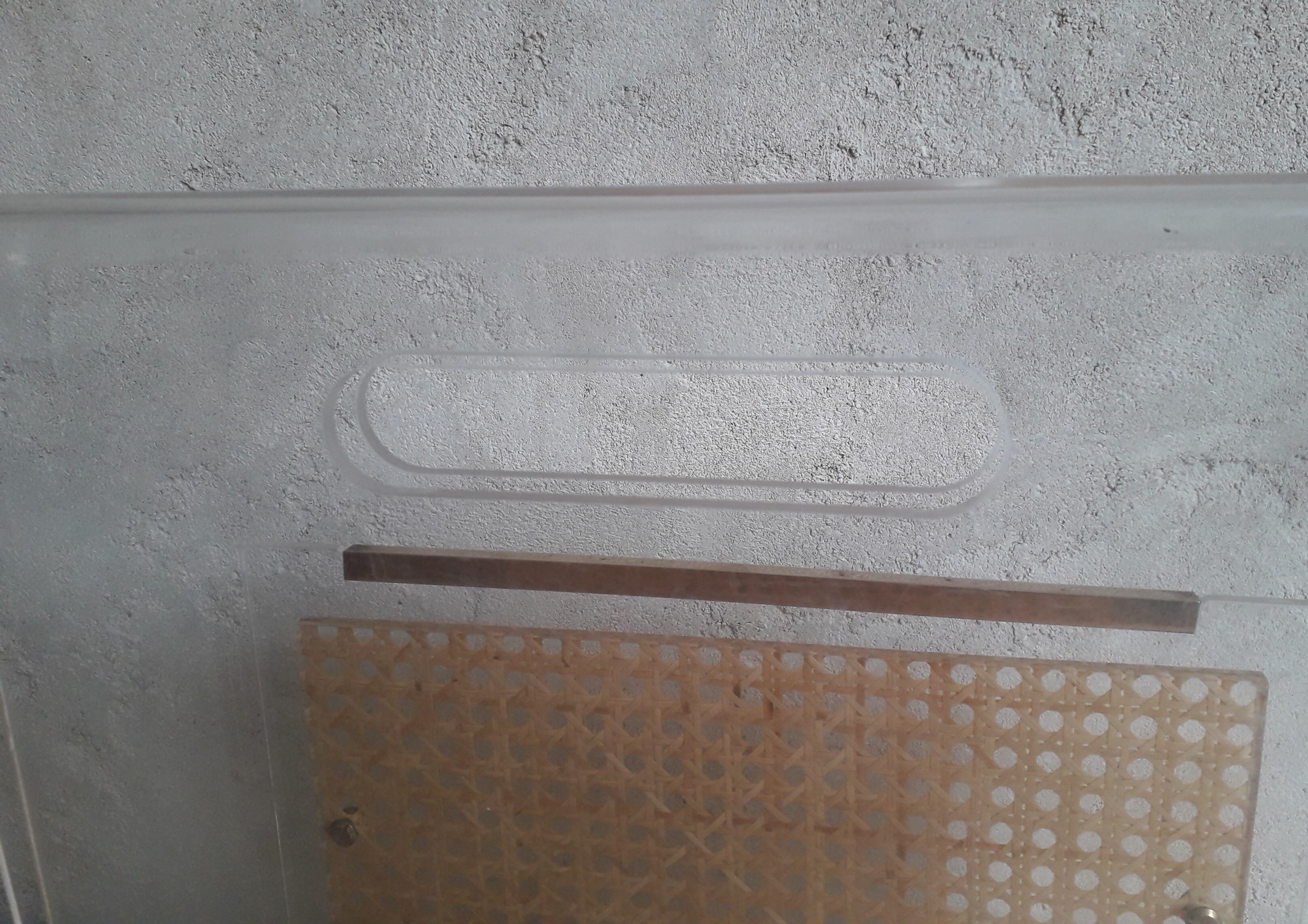 Plexiglas and cannage magazine holder
