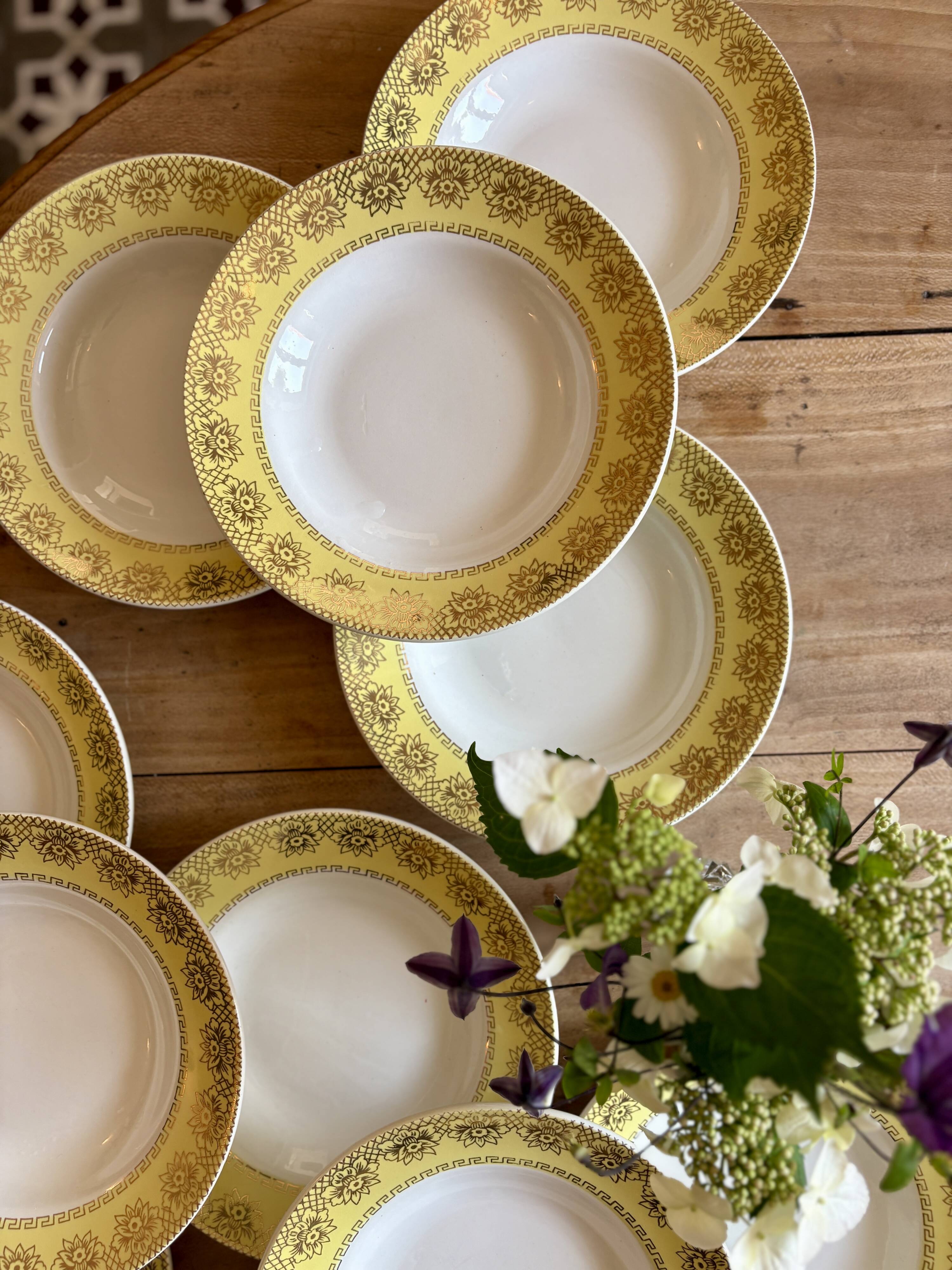 Set of 12 vintage yellow, white and gold soup plates