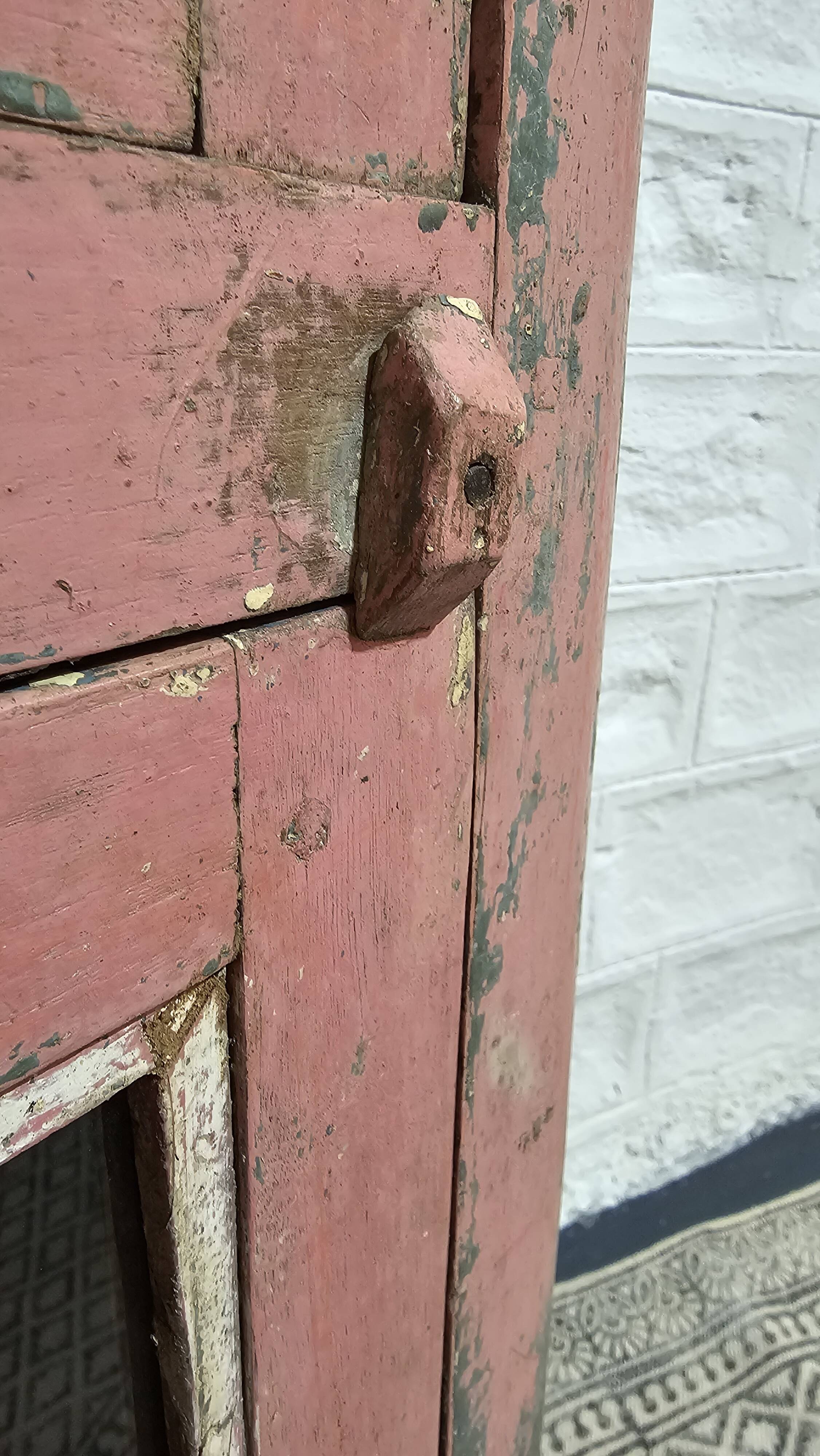 Pink showcase in Burmese teak