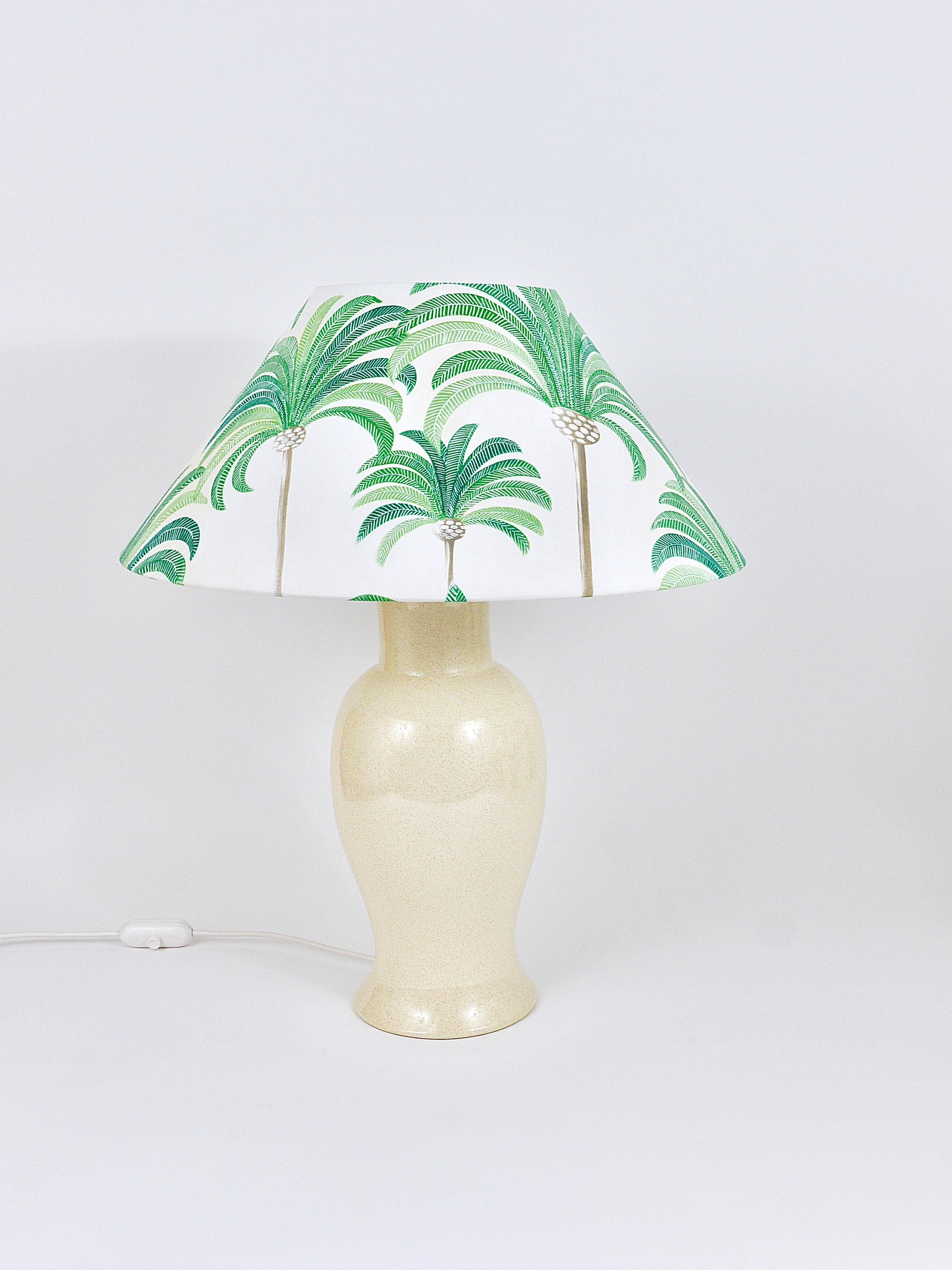 Pair of Tommaso Barbi Riviera palm tree table lamps from the 1970s with matching cushions.