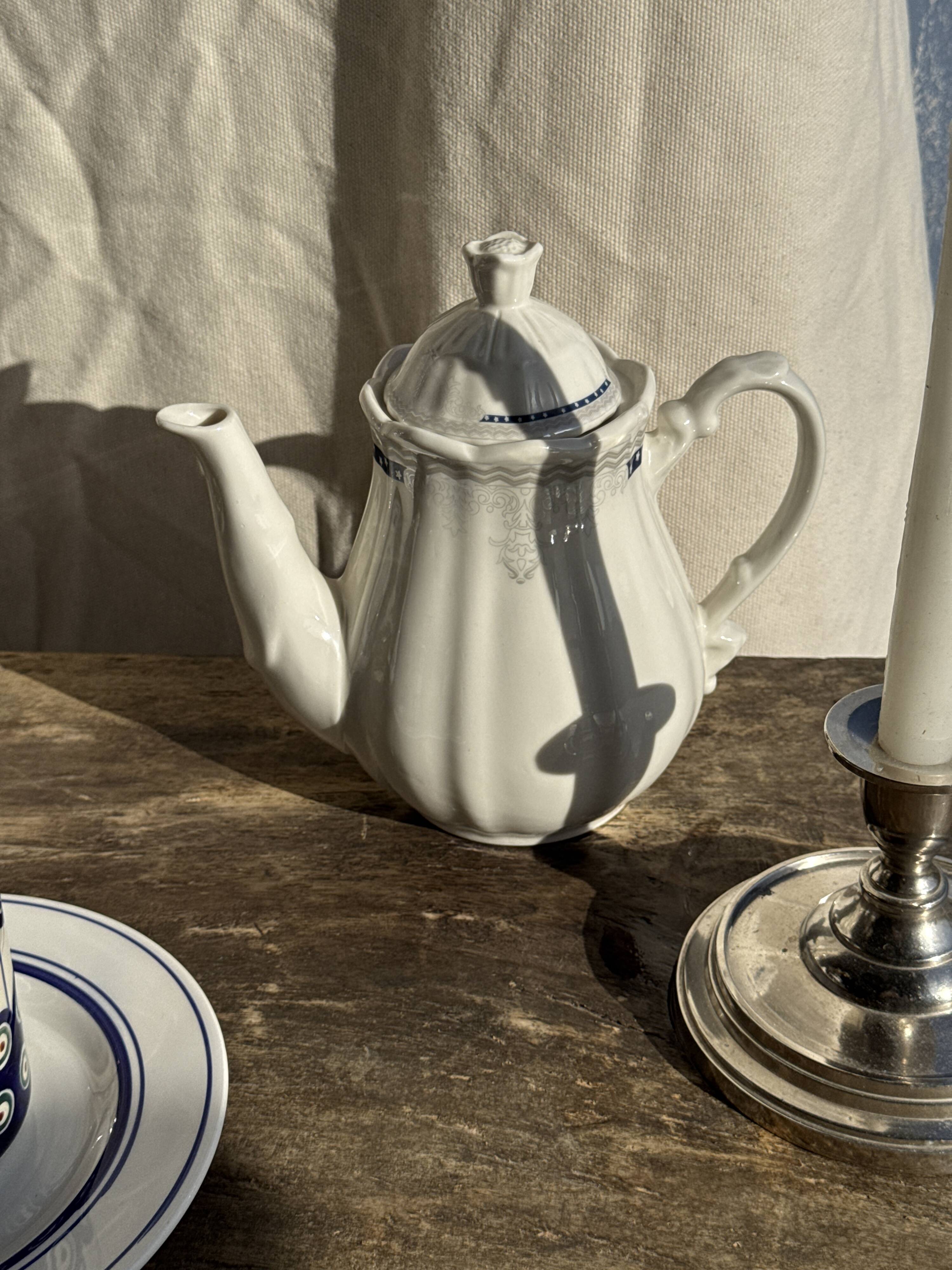 White earthenware teapot with blue and silver trim H22.5