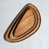 Trio of rounded triangular shaped trays or cups in monoxyl teak