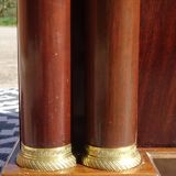 Flamed mahogany enfilade with sea green marble in Empire style.