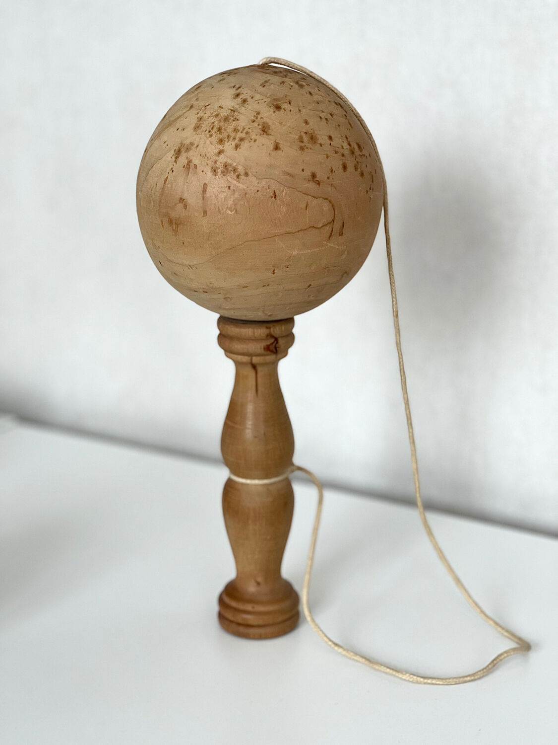 Old wooden bilboquet