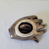 Empty pockets in the shape of a hand