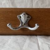 Vintage wooden wall-mounted coat rack with three double hooks