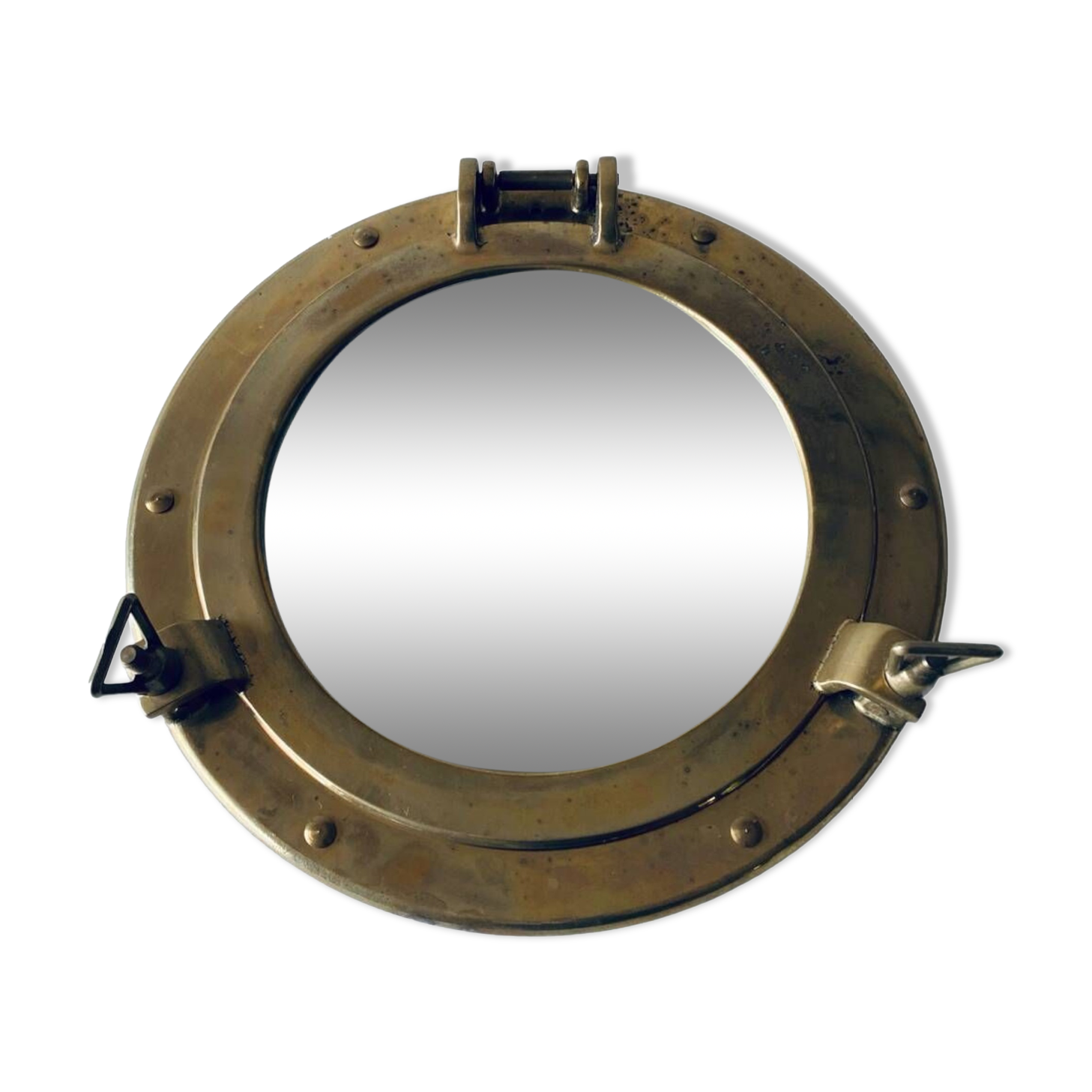 Porthole mirror in gilded brass