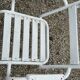Garden furniture in wrought iron and wooden slats composed of two armchairs, 4 chairs and a table.