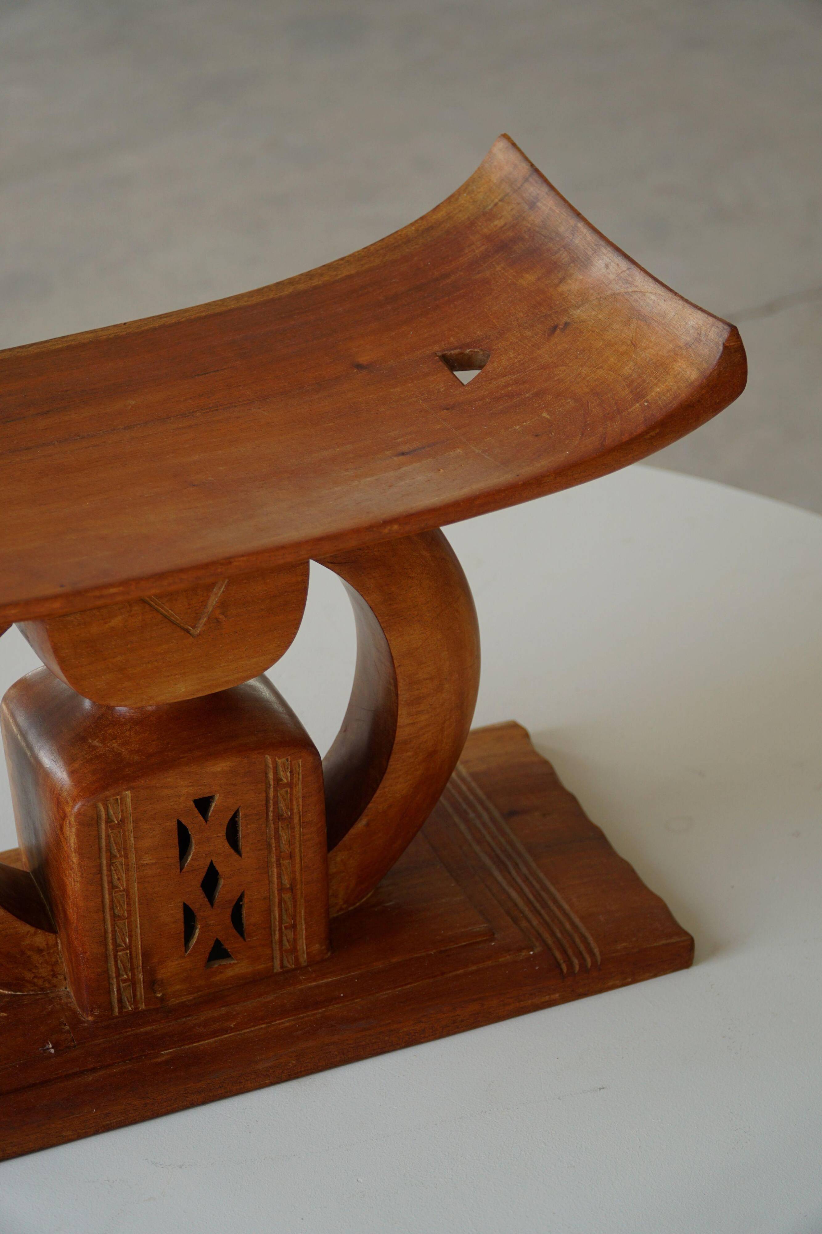 Ashanti stool from West Africa, carved from hardwood, 20th century.