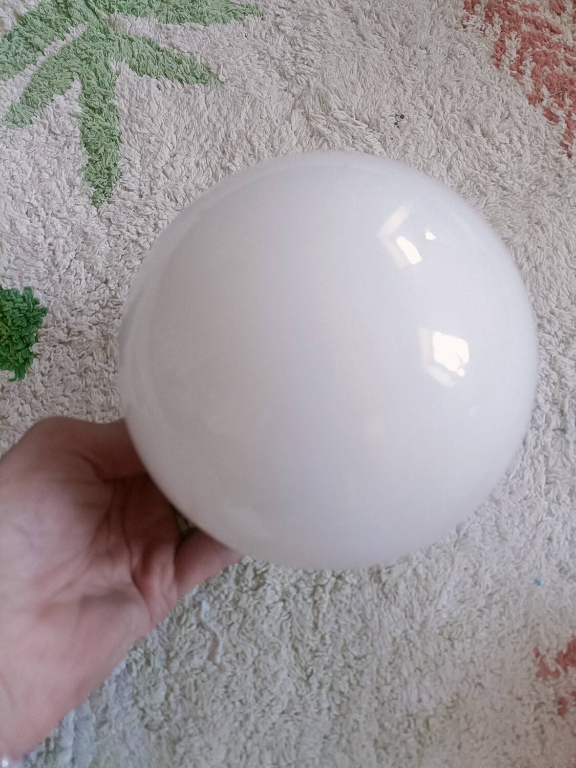 Two opaline glass globe wall lights