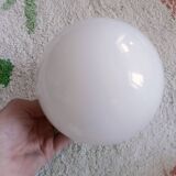 Two opaline glass globe wall lights